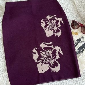 Burgundy skirt from Calvin Klein. I wore it one time. Like new condition.